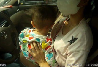 重庆一女子驾车时喂奶且未系安全带 被罚200元