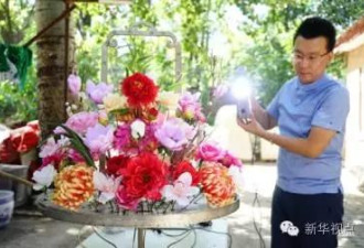 天安门广场有个特大花篮,你知道花是咋&quot;插&quot;的吗