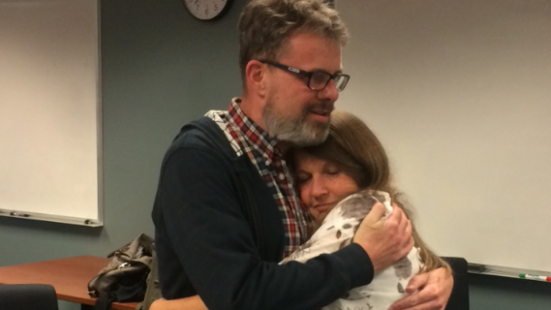 Kevin and Julia Garratt are reunited at Vancouver airport following Kevin's return to Canada. Kevin Garratt had been detained in China since 2014, but was deported on Thursday.
