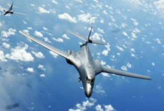 美国轰炸机飞越东海南海意在警告中朝？