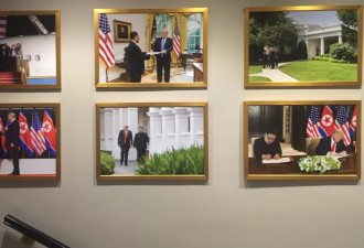 特朗普与金正恩合影挂满白宫走廊 马克龙消失