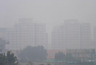 京津雾霾季空气重污染 城市如面纱笼罩