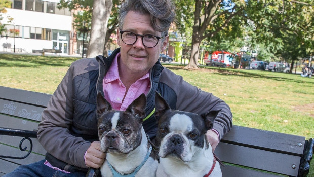 Craig Kilander won't let his two dogs do their business in the parkette outside his condo building, because they've gotten sick from all the urine and feces there.
