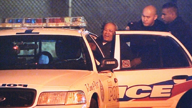 Peter Brooks is taken into custody after an attack at a Toronto seniors home left a 72-year-old woman dead in March 2013.