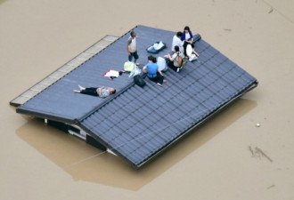 日本创纪录暴雨致51死48失踪 百万人撤离