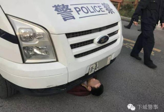 老婆被警车带走 杭州男子做惊人举动 被行拘
