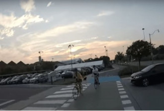 视频：多伦多一司机挡了自行车道还故意撞人！