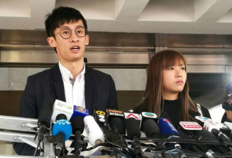 梁游高院外讲述下步行动 二人被疑包揽诉讼