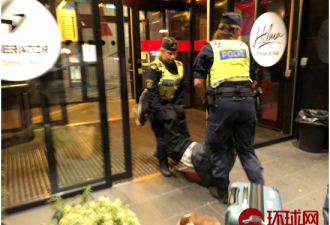 中国游客遭瑞典警方暴打 拖出酒店扔坟场