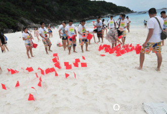 中国游客“占领”泰国海滩 插上大量中国国旗