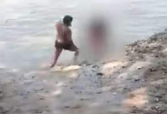 印度两男子在圣河边轮奸祈祷女子并自拍上传...