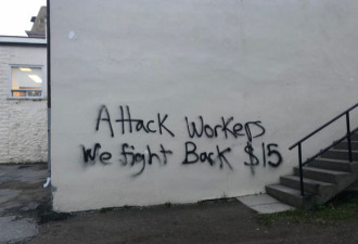 最低时薪被冻结 有人对劳工部长涂鸦抗议