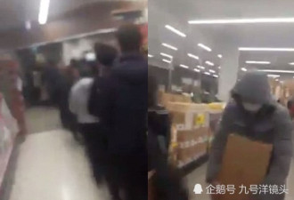 中国代购澳超市疯抢奶粉：捂住脸从仓库往外抱