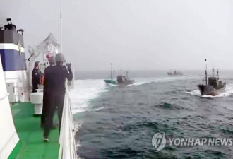 韩海警对中国渔船开火 发射900发子弹驱离70艘