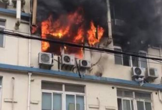 上海一办公楼起大火 被困人员爬墙惊险逃生