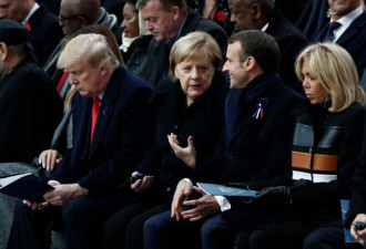 特朗普坐在台下，法国马克龙痛批“美国优先”