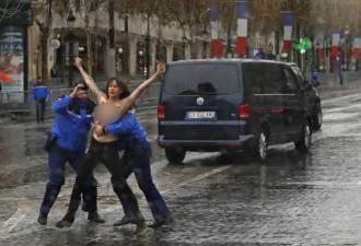 上空女子在巴黎市区逼近川普车队 遭逮捕