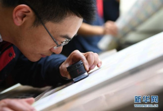 2.6亿张外国钞票在中国江西印制 成品捆扎装箱