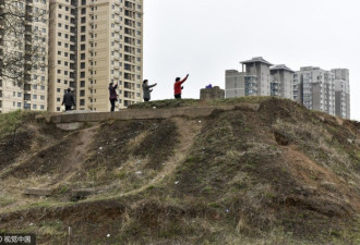 千年古墓惊现西安闹市 变居民“后花园”