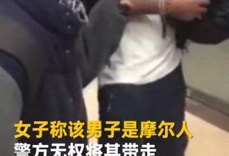 黑人上海行窃被抓倒地装死, 中国女友阻挠执法