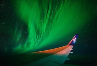 全球首个观赏极光航班首航 景色奇幻如梦境