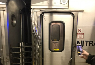 纽约火车出轨 与另一列车擦身乘客身边玻璃没了