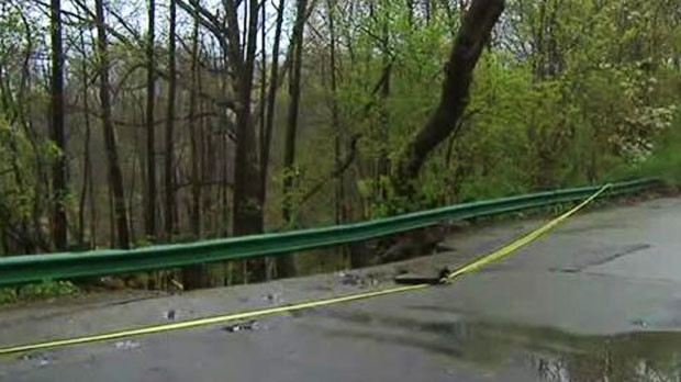 Around four-feet of the roadway crumbled, and is still breaking off due to weather related erosion, Toronto Fire told CP24 on Friday evening. (CP24)