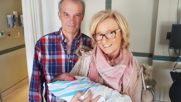 Belgian citizens Ludo Jacques and Christine Hardeman, pictured here with newborn granddaughter Ella, hoped to immigrate to Canada under the family reunification program, but their daughter's form was not selected under a new lottery system.
