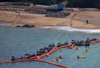 日本填海为美建基地 民众乘皮划艇与警方对峙