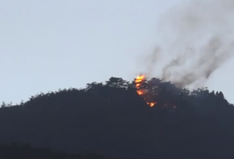 韩国萨德部署地附近山头突发大火 原因不详