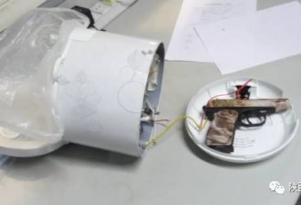 咸阳机场现神秘包裹 一把手枪牵出地下兵工厂