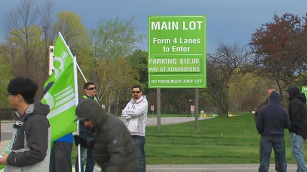 Striking workers walk the picket line at the Toronto Zoo.