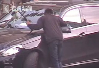 上海街头现奇葩乞讨不给100元就拗断你的雨刮器