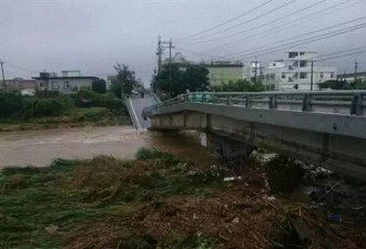 台湾暴雨:大桥被冲断 台北故宫如瀑布