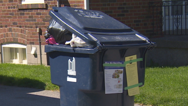 Under the pilot project, if contaminants are found in recycling bins, workers will tag the bins and pull them from the curb so residents can remove the contaminated material.