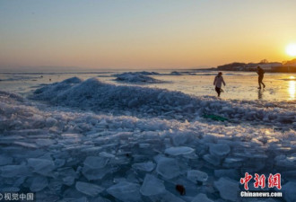 天气升温变暖 中俄界湖兴凯湖达到零上坚冰融化