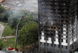 伦敦公寓大火终于全扑灭 女首相梅视察现场