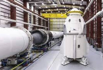 SpaceX载人飞船无人首飞入轨 火箭成功回收