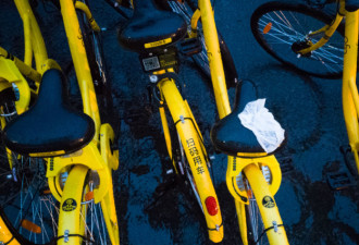 北京暴雨黄色预警 共享单车无人问津成路障