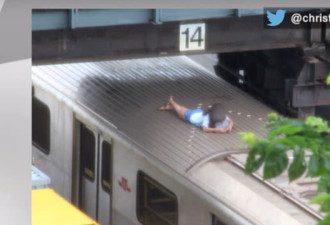 惊！13岁小女孩爬到TTC地铁顶上自拍还睡觉