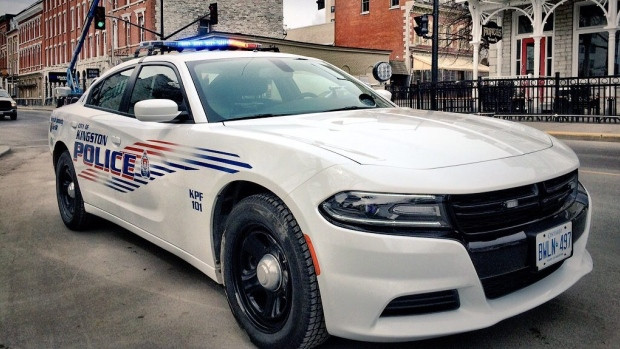 A 58-year-old Kingston man has been charged with assault after a driver allegedly bit a pedestrian in a road rage incident on Canada Day.