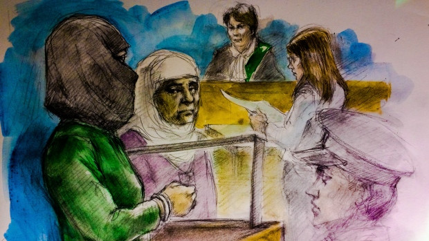 A woman accused of assault and threatening people with a knife in a Canadian Tire store in Scarborough, Ont., appeared in court on Tuesday. This sketch made June 6 shows, left to right: the accused Rehab Dughmosh, an Arabic interpreter, Justice of the Peace Alice Napier, and Crown attorney Candice Suter.