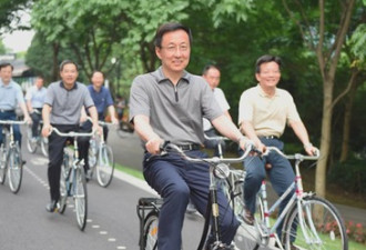 韩正骑共享单车照片刷屏 网友为啥喊“酷”？