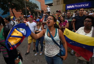 委内瑞拉反对派公投 枪手血洗票站致2死4伤
