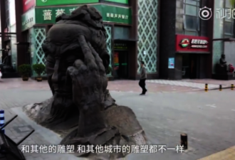 怪吓人的！司马迁“头疼”雕像埋街边 市民吐槽
