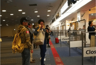 谢霆锋王菲一同现身日本 包裹很严实
