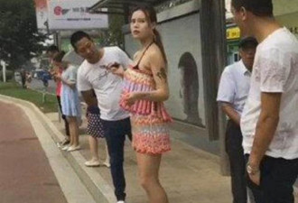 防暑神器 中国女子穿冰棒衣等公车