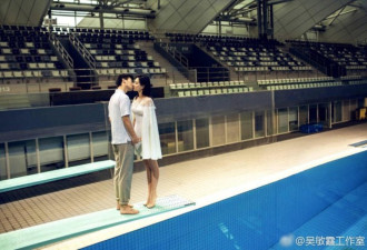 吴敏霞婚纱照曝光 跳水台上与老公亲吻超甜蜜