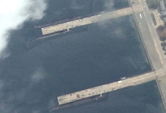 卫星照片首次显示中国4艘战略核潜艇同框