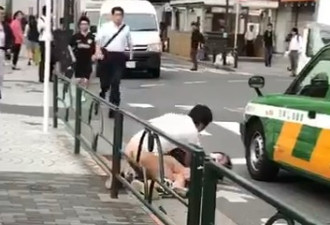 下半身全裸中国人在日本街头压住女子…